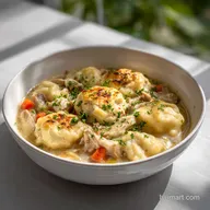 Chicken and Dumplings: Velvety Broth, Fluffy Biscuits